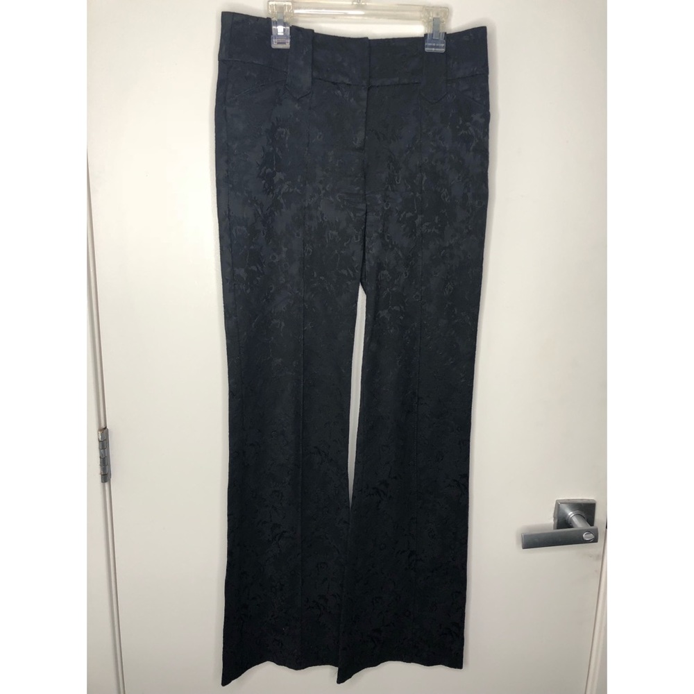 Black slacks with floral design